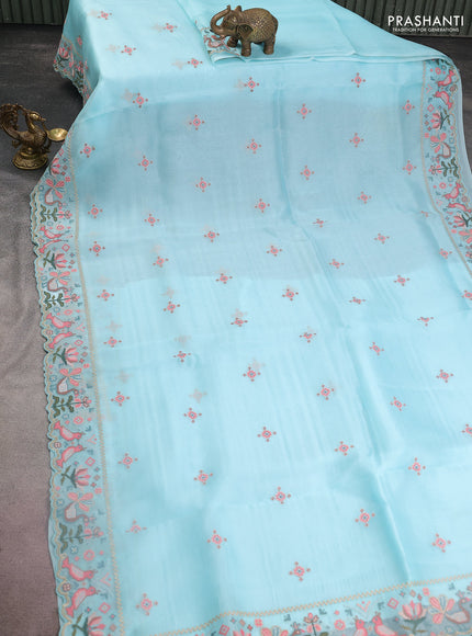 Pure organza silk saree light blue with embroided buttas and embroided border