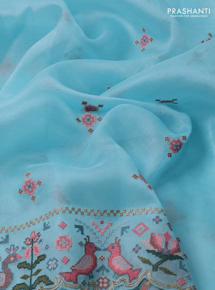 Pure organza silk saree light blue with embroided buttas and embroided border