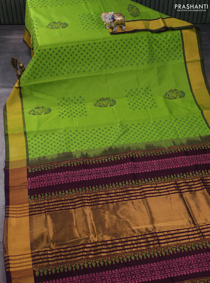 Silk cotton block printed saree light green and deep wine shade with floral butta prints and zari woven border