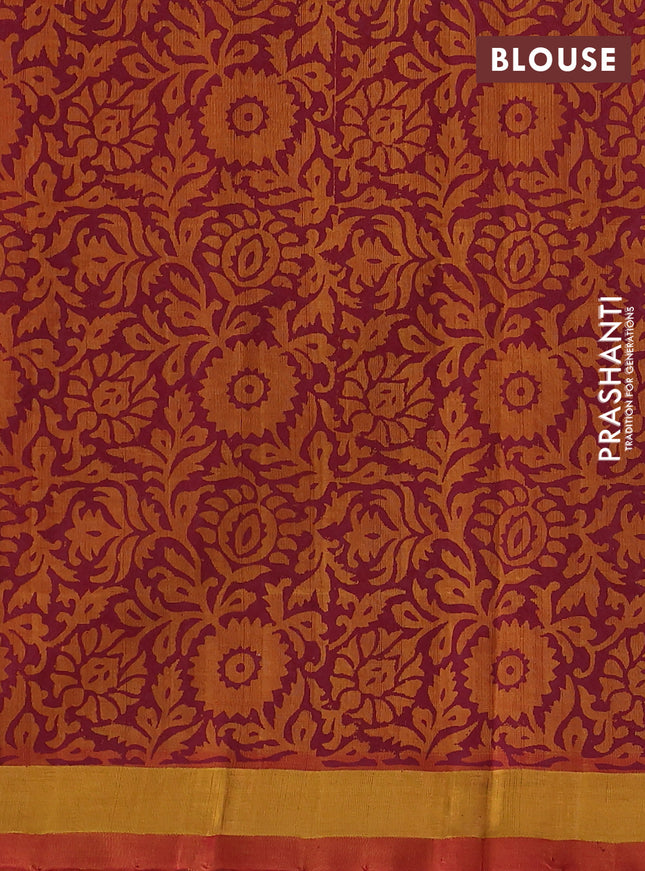 Silk cotton block printed saree sunset orange with allover prints and zari woven border