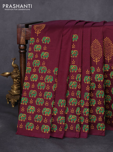 Silk cotton block printed saree deep wine shade with elephant butta prints and printed border