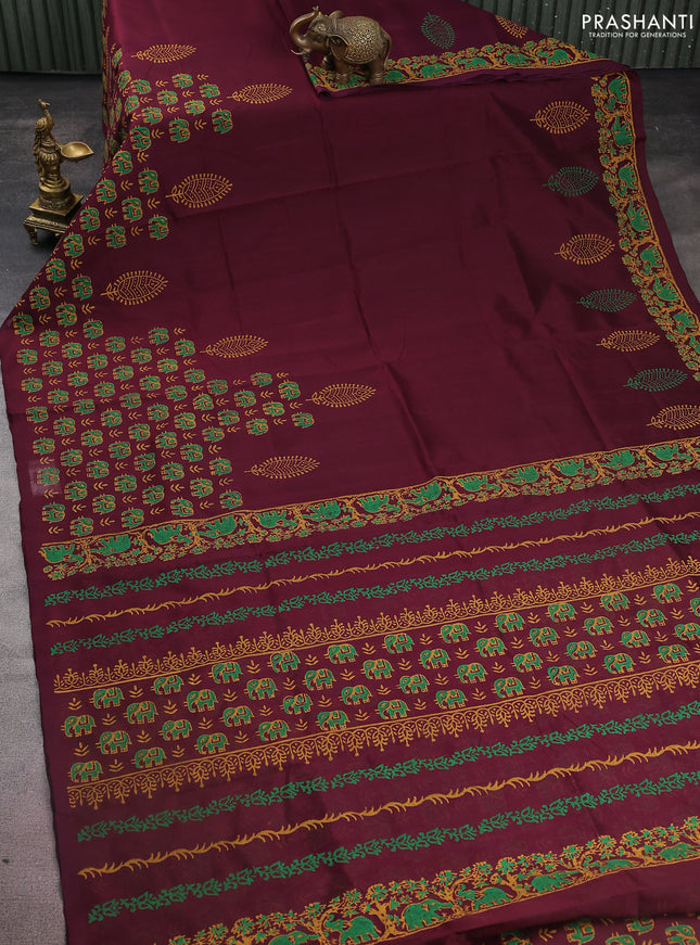Silk cotton block printed saree deep wine shade with elephant butta prints and printed border