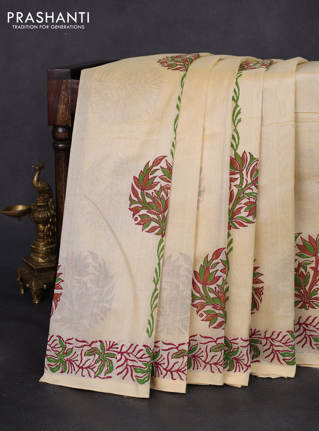 Silk cotton block printed saree cream with allover prints and printed border