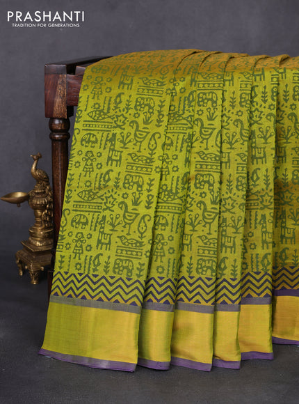 Silk cotton block printed saree lime green and violet with allover prints and zari woven border