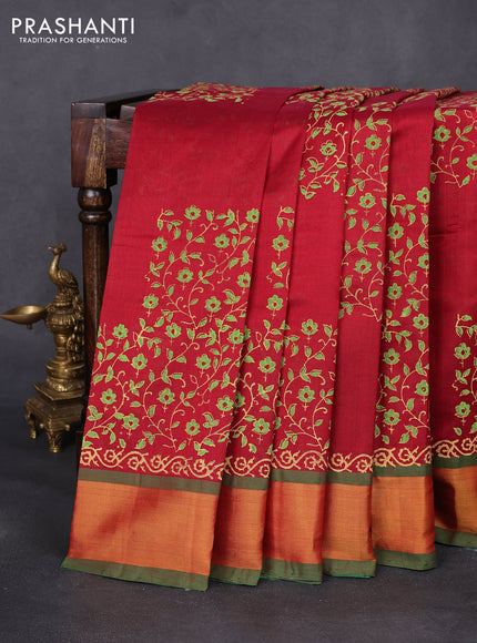 Silk cotton block printed saree maroon and green with allover prints and zari woven border