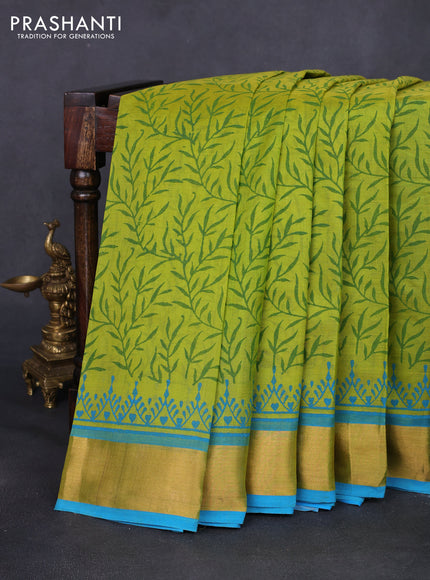 Silk cotton block printed saree light green and light blue with allover prints and zari woven border