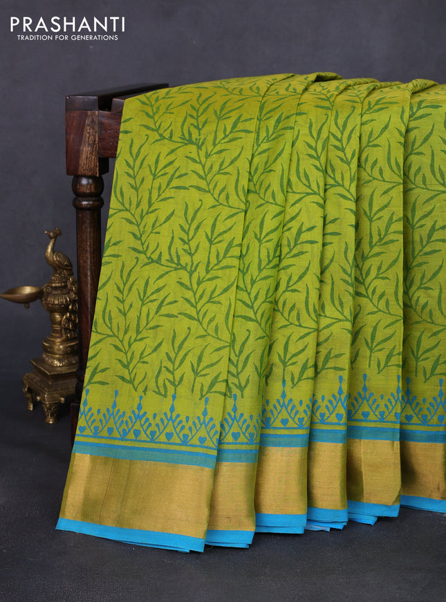 Silk cotton block printed saree light green and light blue with allover prints and zari woven border