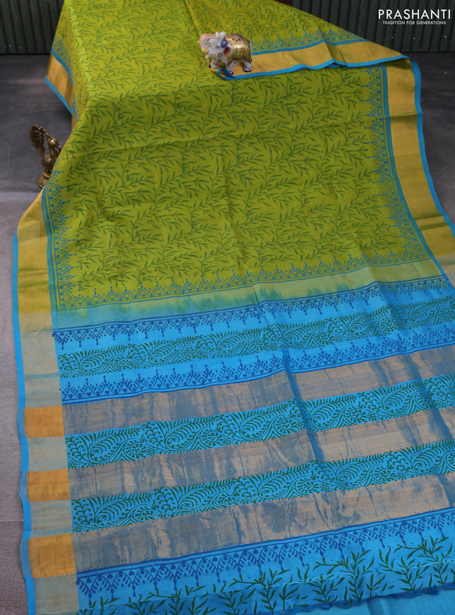 Silk cotton block printed saree light green and light blue with allover prints and zari woven border