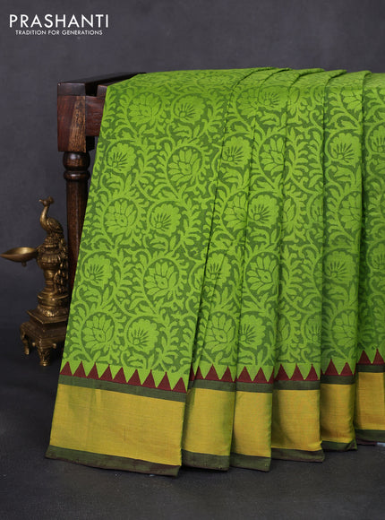 Silk cotton block printed saree light green and wine shade with allover prints and zari woven border