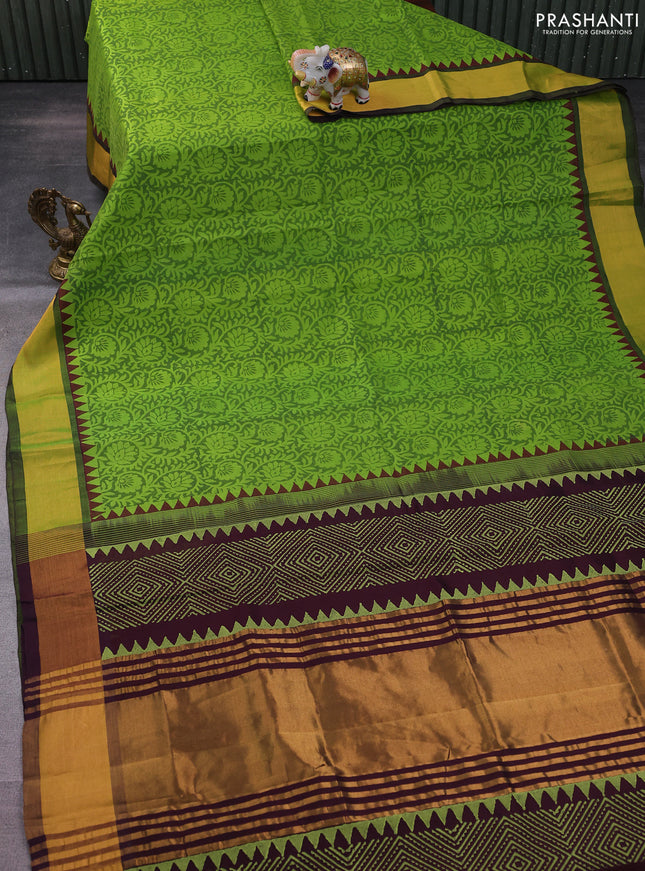 Silk cotton block printed saree light green and wine shade with allover prints and zari woven border