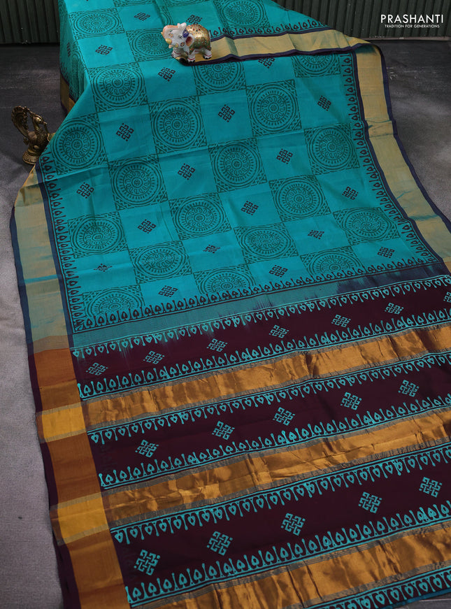 Silk cotton block printed saree teal green shade and wine shade with allover prints and zari woven border