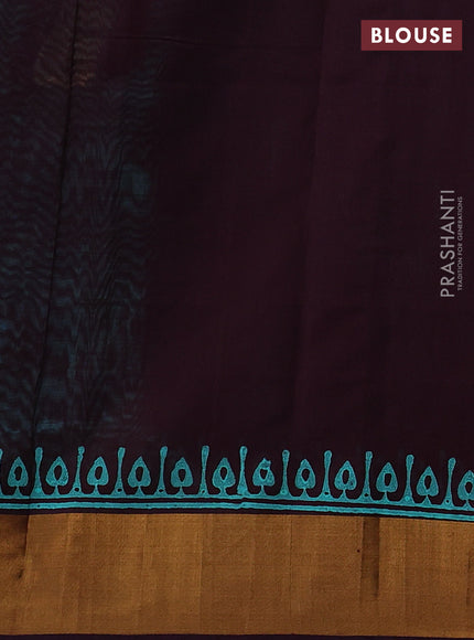 Silk cotton block printed saree teal green shade and wine shade with allover prints and zari woven border