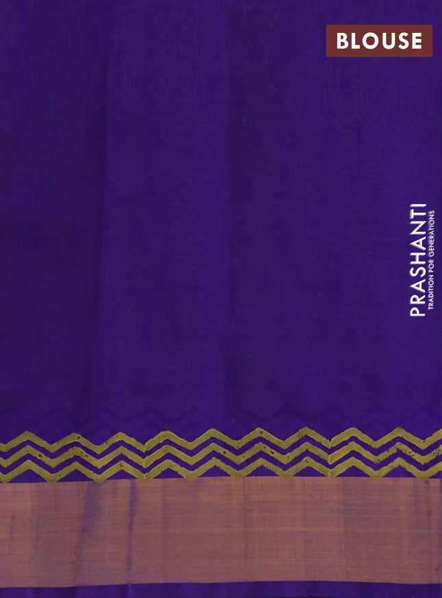 Silk cotton block printed saree dual shade of light green and violet with allover warli prints and zari woven border