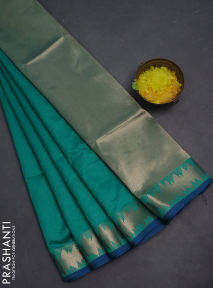 Semi dupion saree teal green and blue with plain body and temple design zari woven border