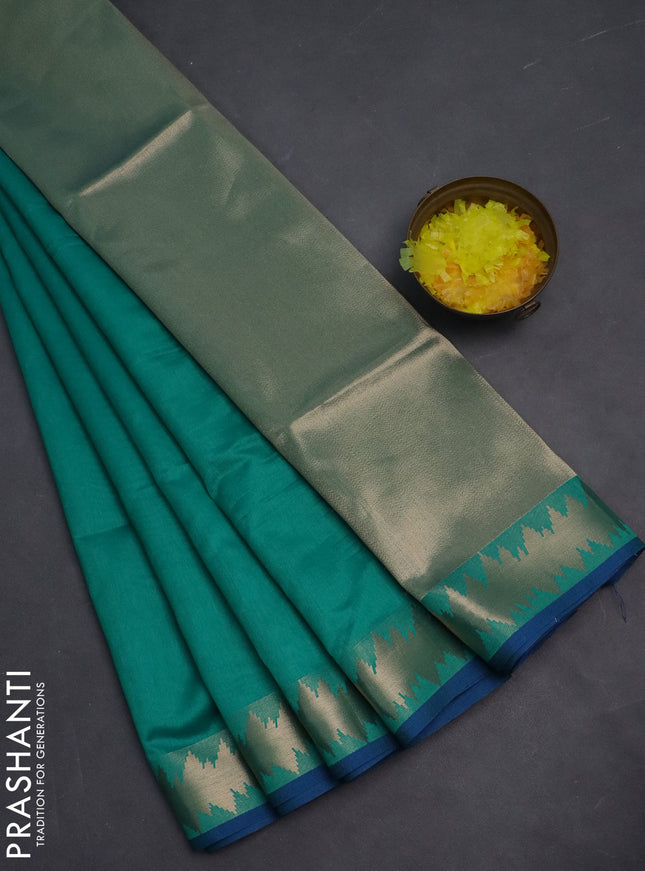 Semi dupion saree teal green and blue with plain body and temple design zari woven border