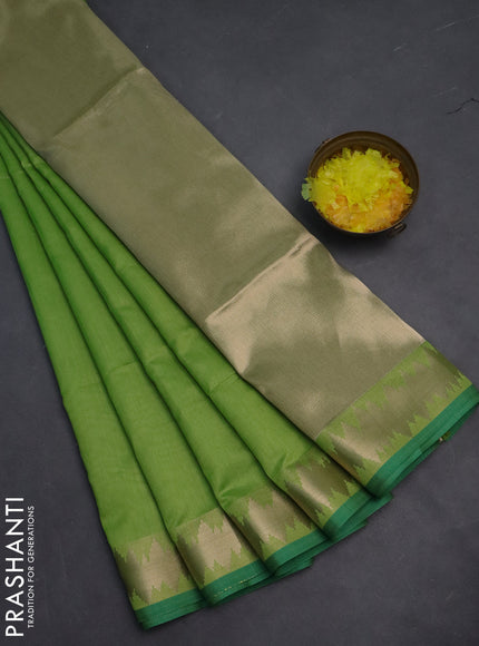 Semi dupion saree light green and teal green with plain body and temple design zari woven border