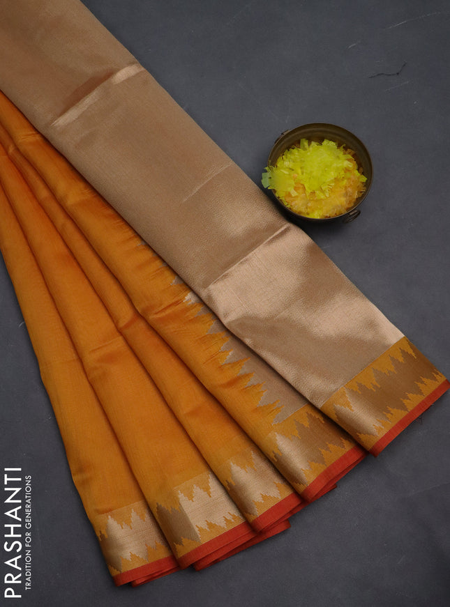 Semi dupion saree mango yellow and orange with plain body and temple design zari woven border