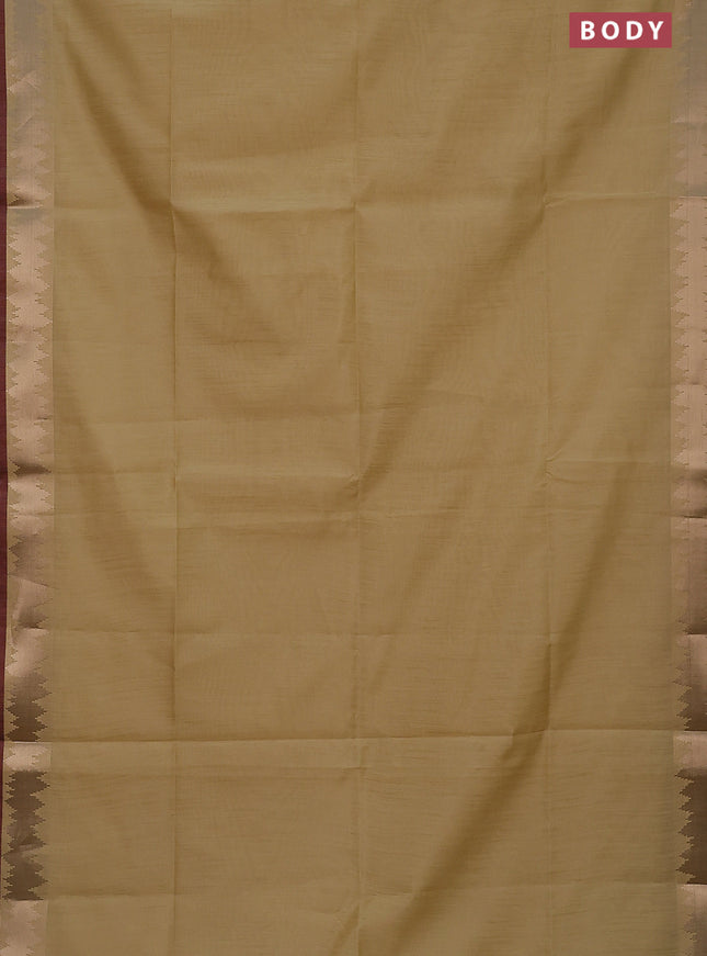 Semi dupion saree cream and maroon with plain body and temple design zari woven border