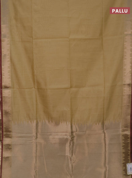 Semi dupion saree cream and maroon with plain body and temple design zari woven border