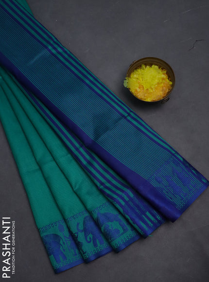 Semi dupion saree teal green and blue with allover stripe pattern and thread woven border