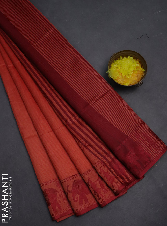 Semi dupion saree dark peach and maroon with allover stripe pattern and thread woven border