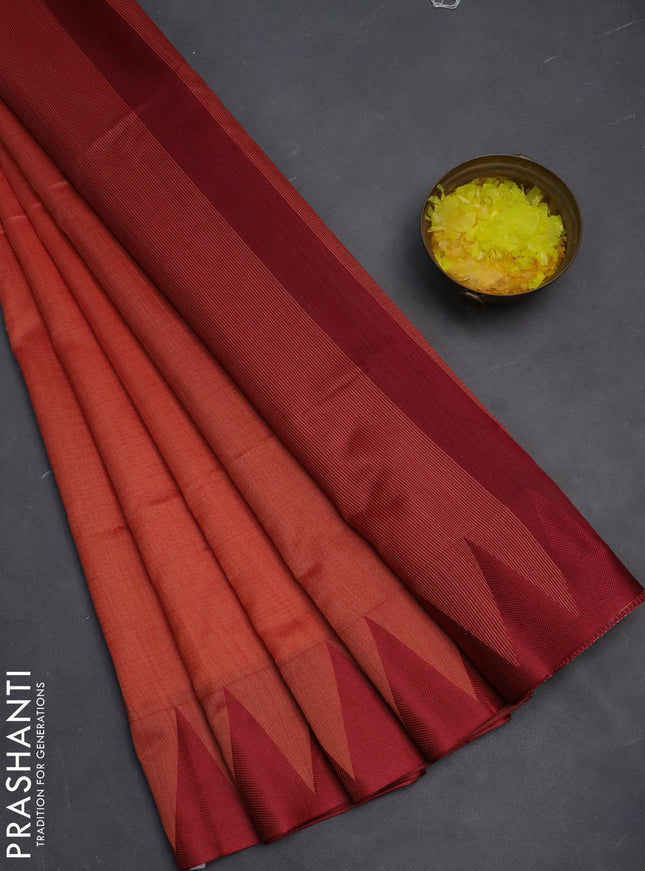 Semi dupion saree dark peach and maroon with allover stripe pattern and temple design thread woven border