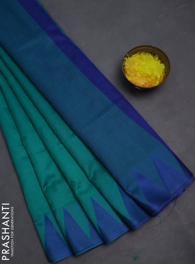 Semi dupion saree teal green and blue with allover stripe pattern and temple design thread woven border