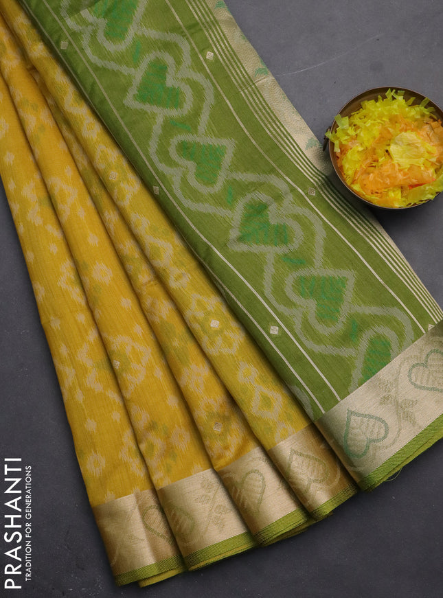 Semi dupion saree mustard yellow and light green with allover thread woven ikat weaves and zari woven border