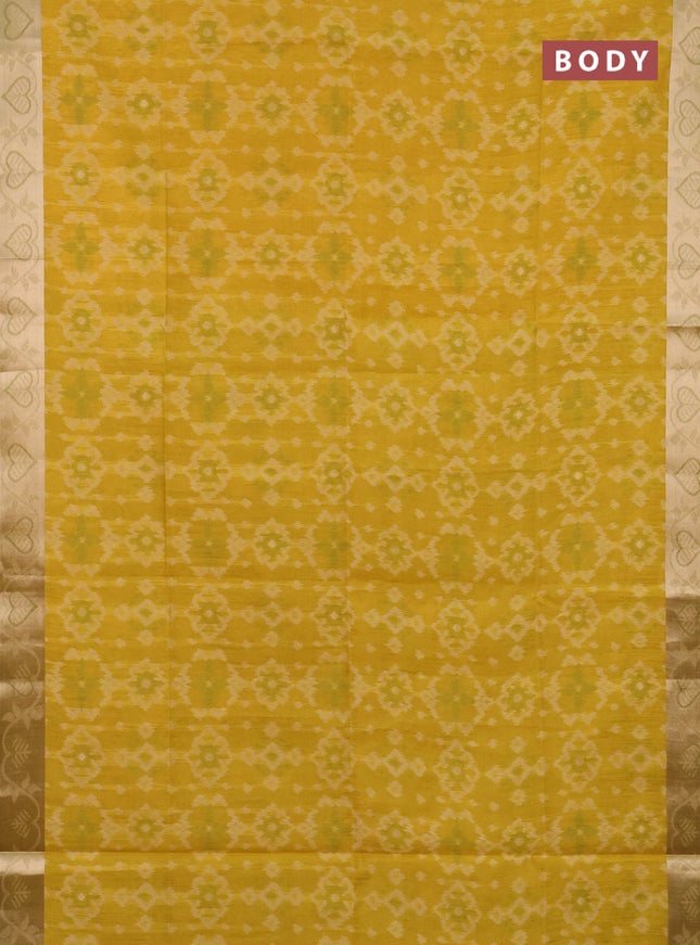 Semi dupion saree mustard yellow and light green with allover thread woven ikat weaves and zari woven border