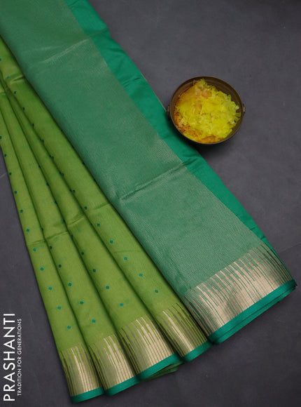Semi dupion saree light green and green with allover thread woven buttas and temple design zari woven border