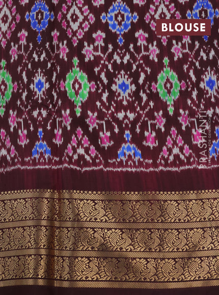 Pochampally silk saree teal blue and wine shade with allover floral digital prints and temple design annam zari woven border