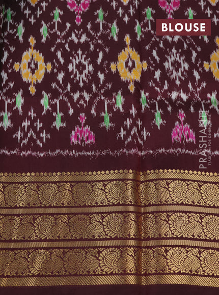 Pochampally silk saree elaichi green and wine shade with allover floral digital prints and temple design annam zari woven border