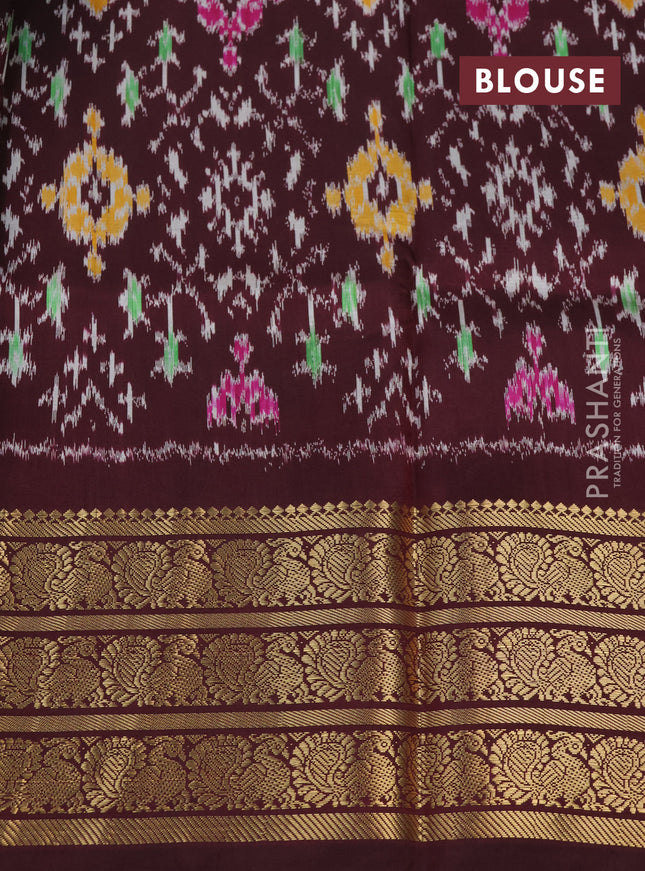 Pochampally silk saree elaichi green and wine shade with allover floral digital prints and temple design annam zari woven border