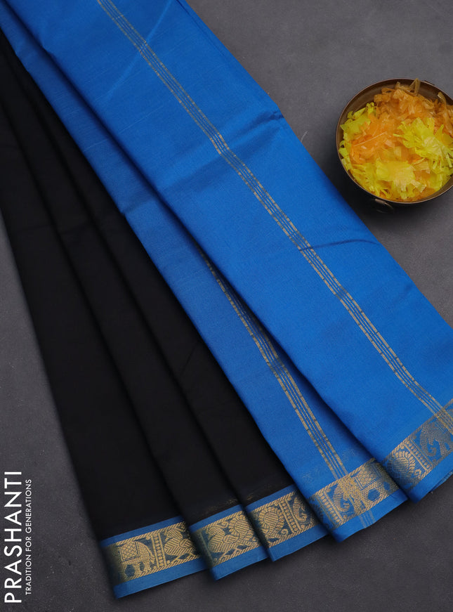 Silk cotton saree black and cs blue with plain body and zari woven border