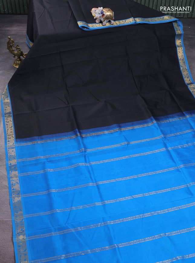 Silk cotton saree black and cs blue with plain body and zari woven border