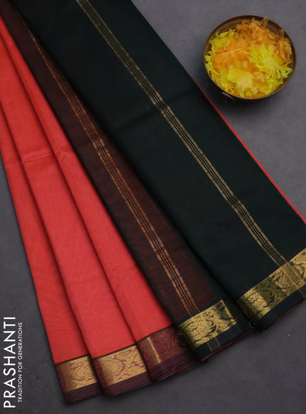Silk cotton saree peach orange and bottle green with plain body and zari woven border