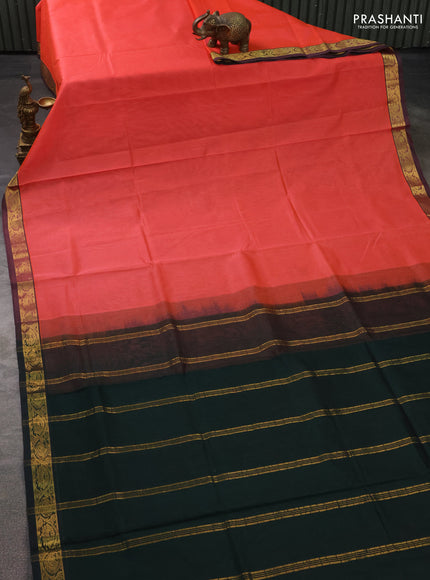 Silk cotton saree peach orange and bottle green with plain body and zari woven border