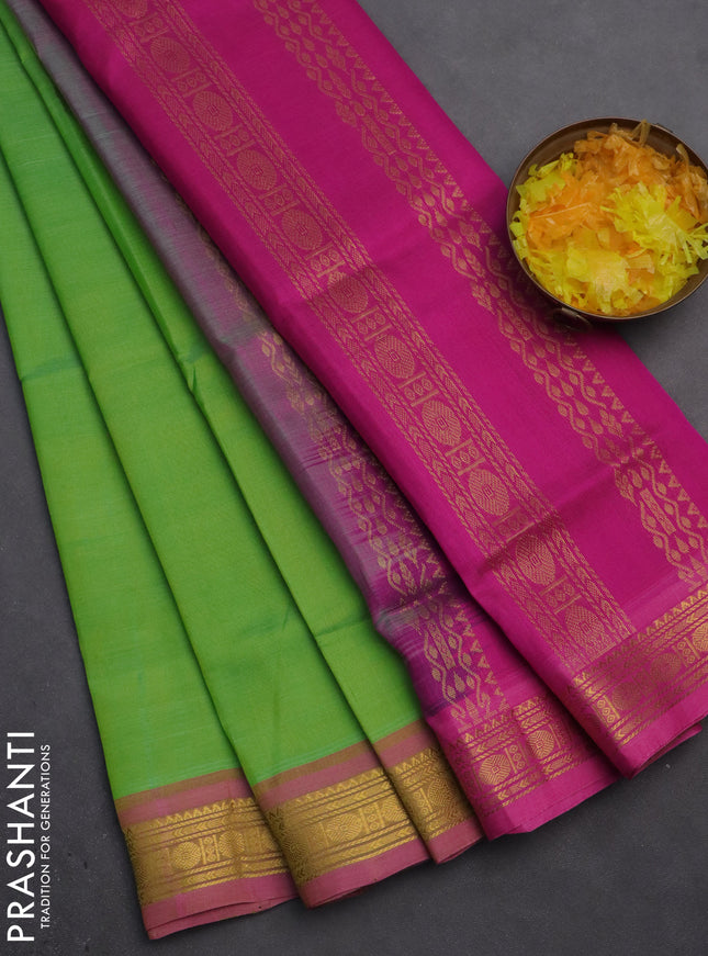 Silk cotton saree light green and pink with plain body and zari woven border