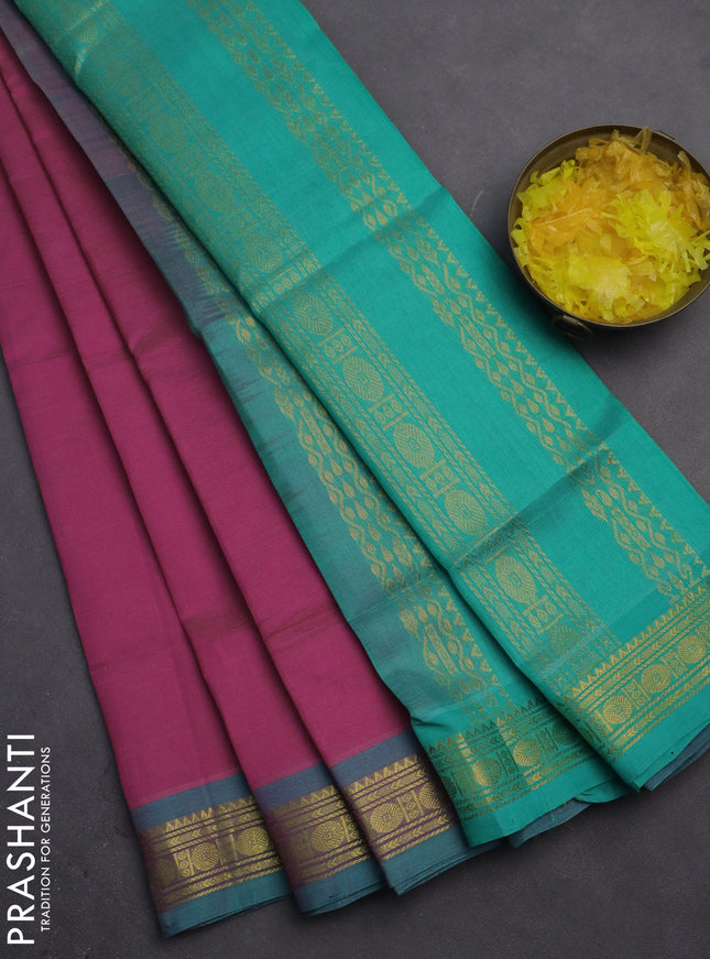 Silk cotton saree magenta pink and teal green with plain body and zari woven border