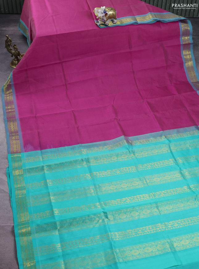 Silk cotton saree magenta pink and teal green with plain body and zari woven border