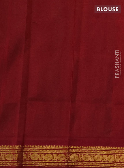 Silk cotton saree green and maroon with plain body and zari woven border