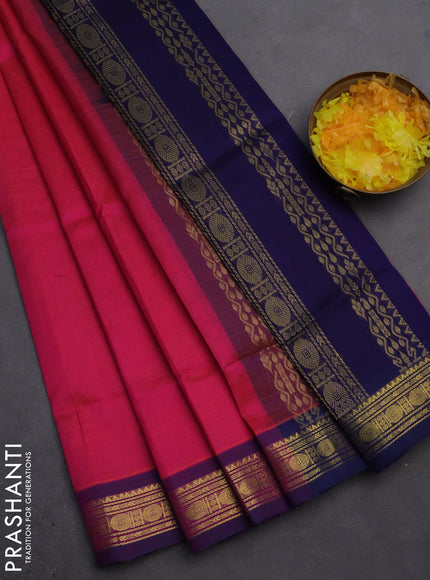 Silk cotton saree pink and dark blue with plain body and zari woven border