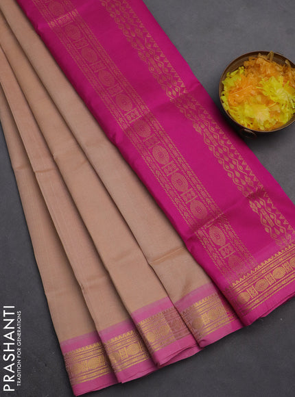 Silk cotton saree sandal and pink with plain body and zari woven border
