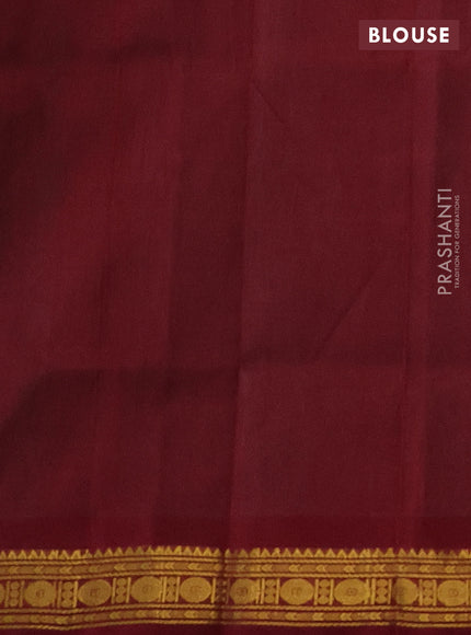 Silk cotton saree teal green and maroon with plain body and zari woven border