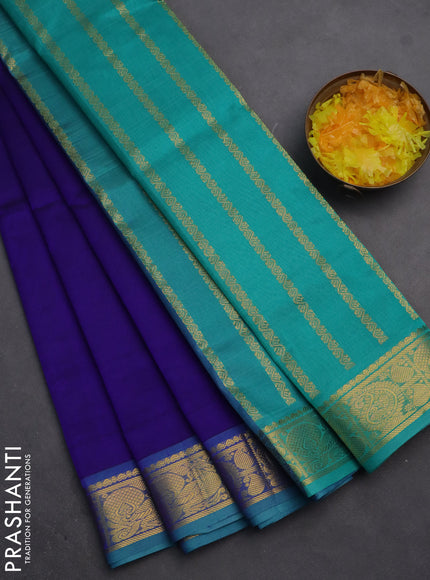 Silk cotton saree blue and teal blue with plain body and zari woven border