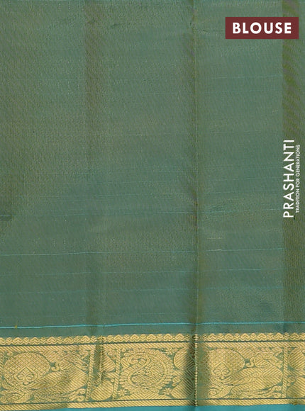 Silk cotton saree maroon and teal green with plain body and zari woven border