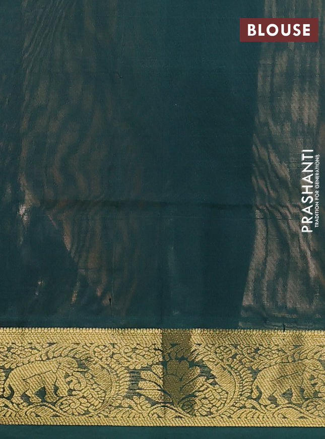 Silk cotton saree pale orange and green with plain body and zari woven border