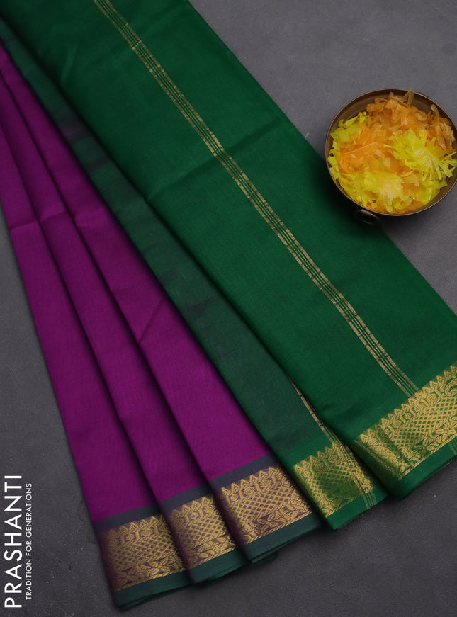 Silk cotton saree purple and green with plain body and zari woven border