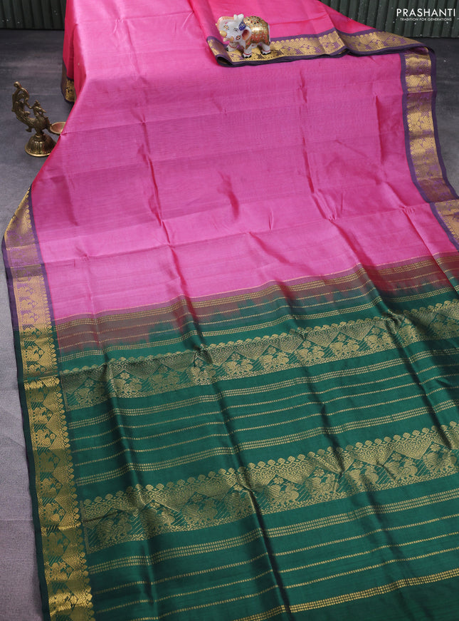 Silk cotton saree pink and dark green with plain body and zari woven border
