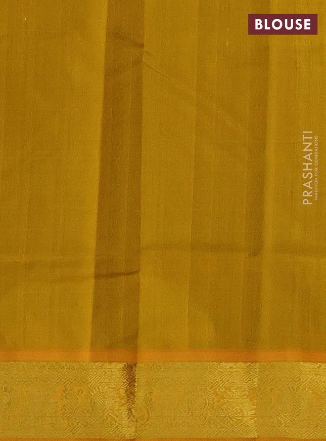 Silk cotton saree green and mustard yellow with plain body and zari woven border